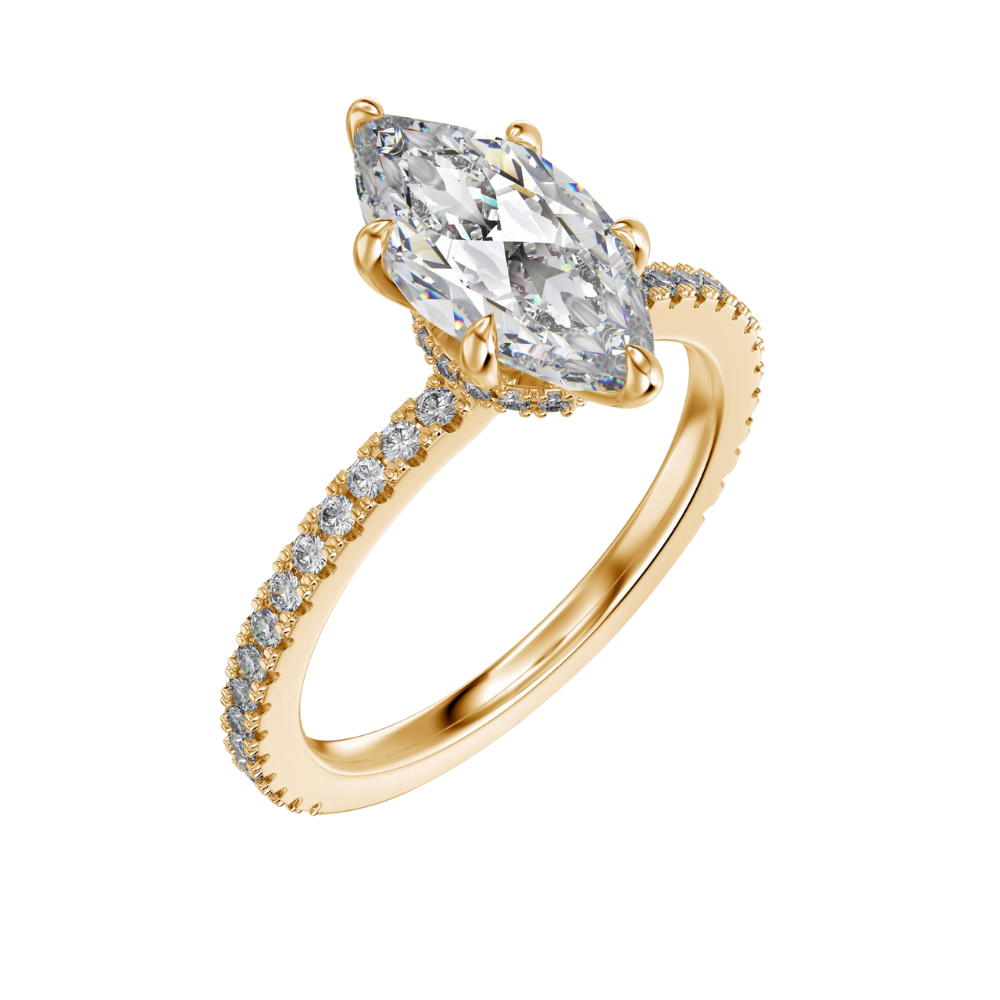 Gold color ring with a large marquise-shaped stone and smaller clear stones on the band against a white background