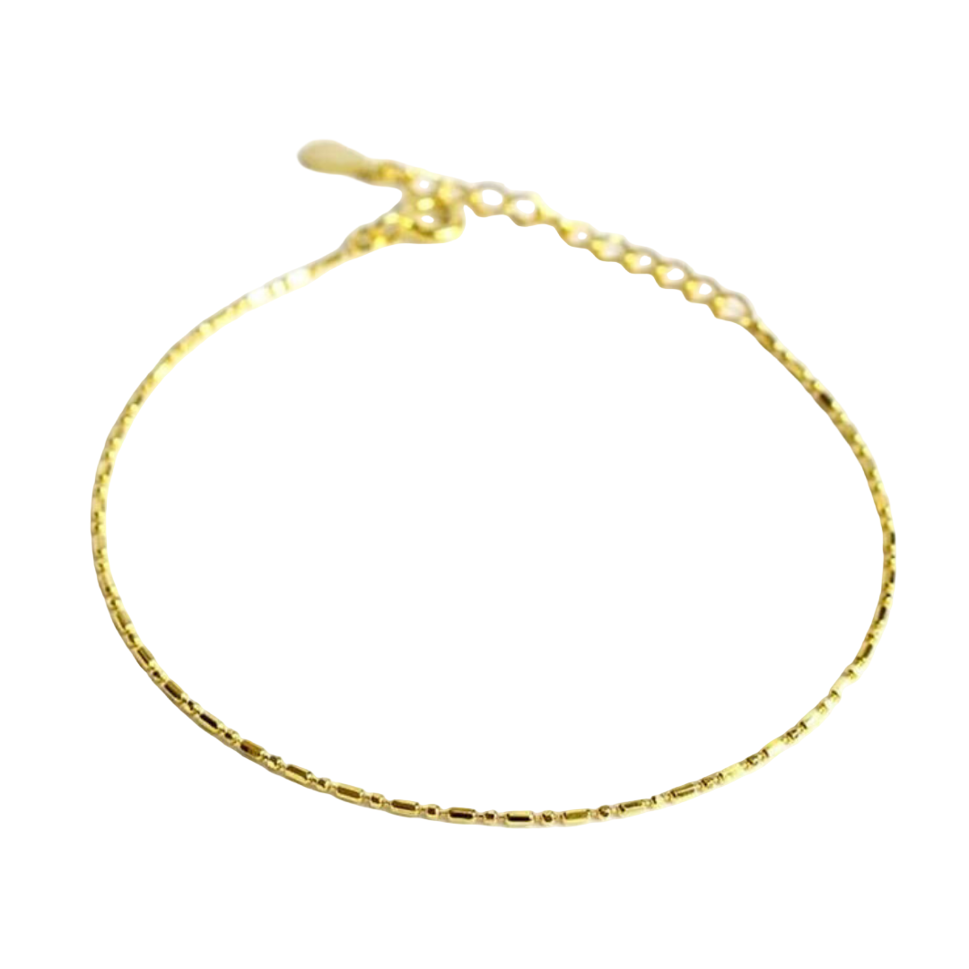 A gold-colored sterling silver chain bracelet with a box clasp closure, presented against a white background.