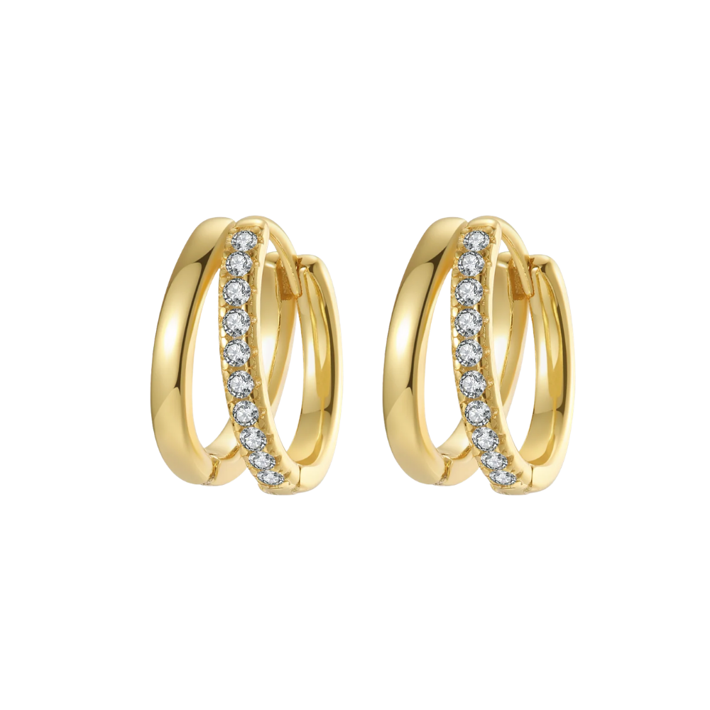 Gold hoop earrings with embedded diamonds on a white background