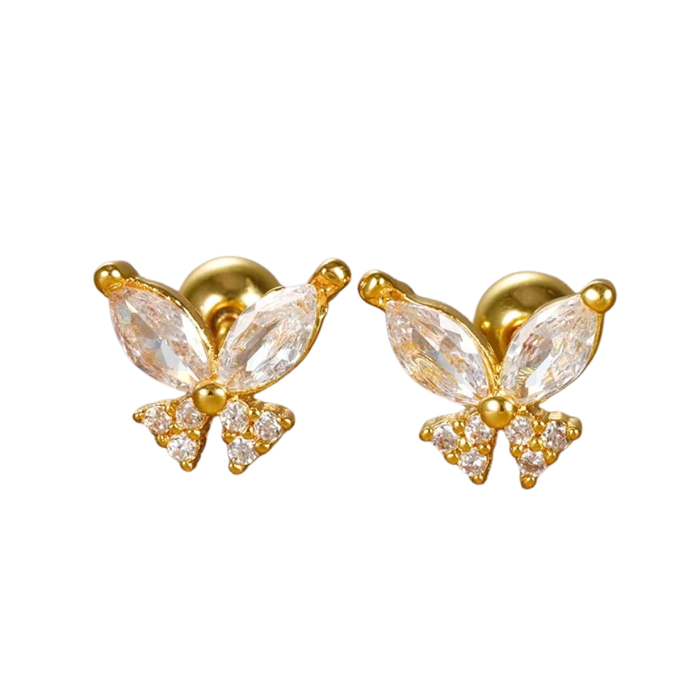 Gold butterfly earrings with clear gemstones on a white background