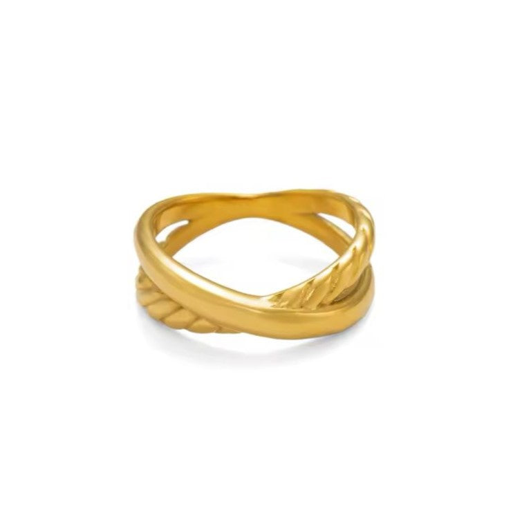 A vintage-inspired twisted stainless steel ring with a gold finish.