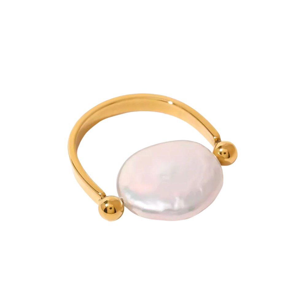 Gold ring with a large pearl on a white background