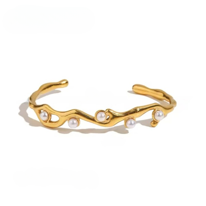A gold-colored stainless steel bracelet with pearl adornments, displayed against a white background.