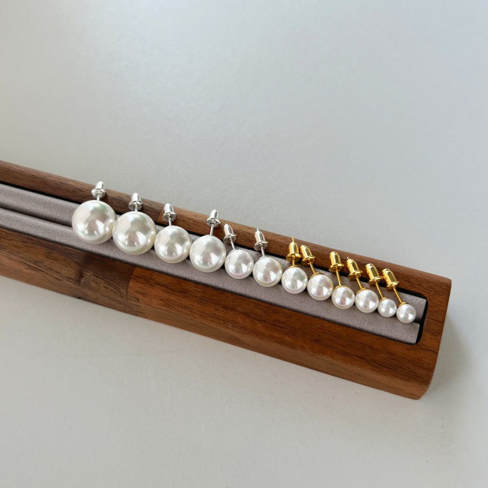 Pairs of classic pearl stud earrings with lustrous pearls sets.