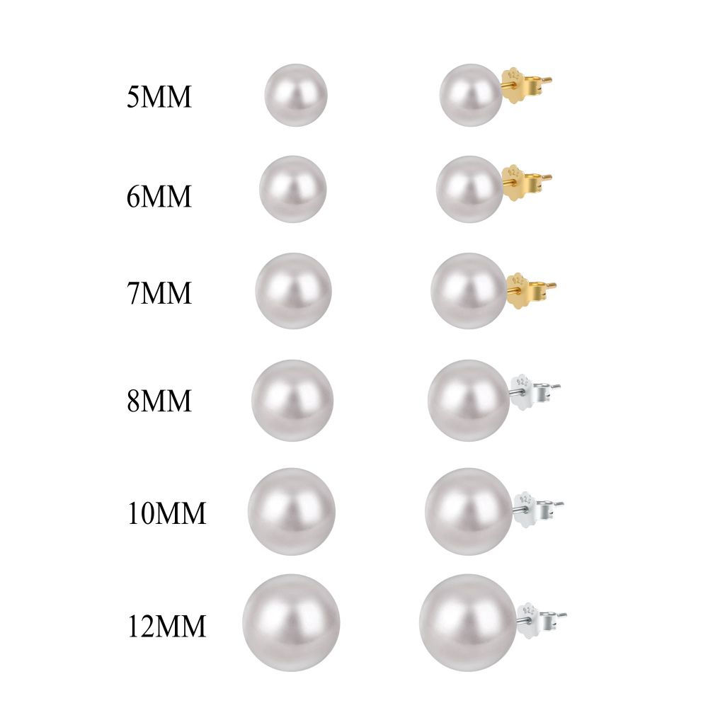 Pairs of classic pearl stud earrings with lustrous pearls set against a gold and silver backing.
