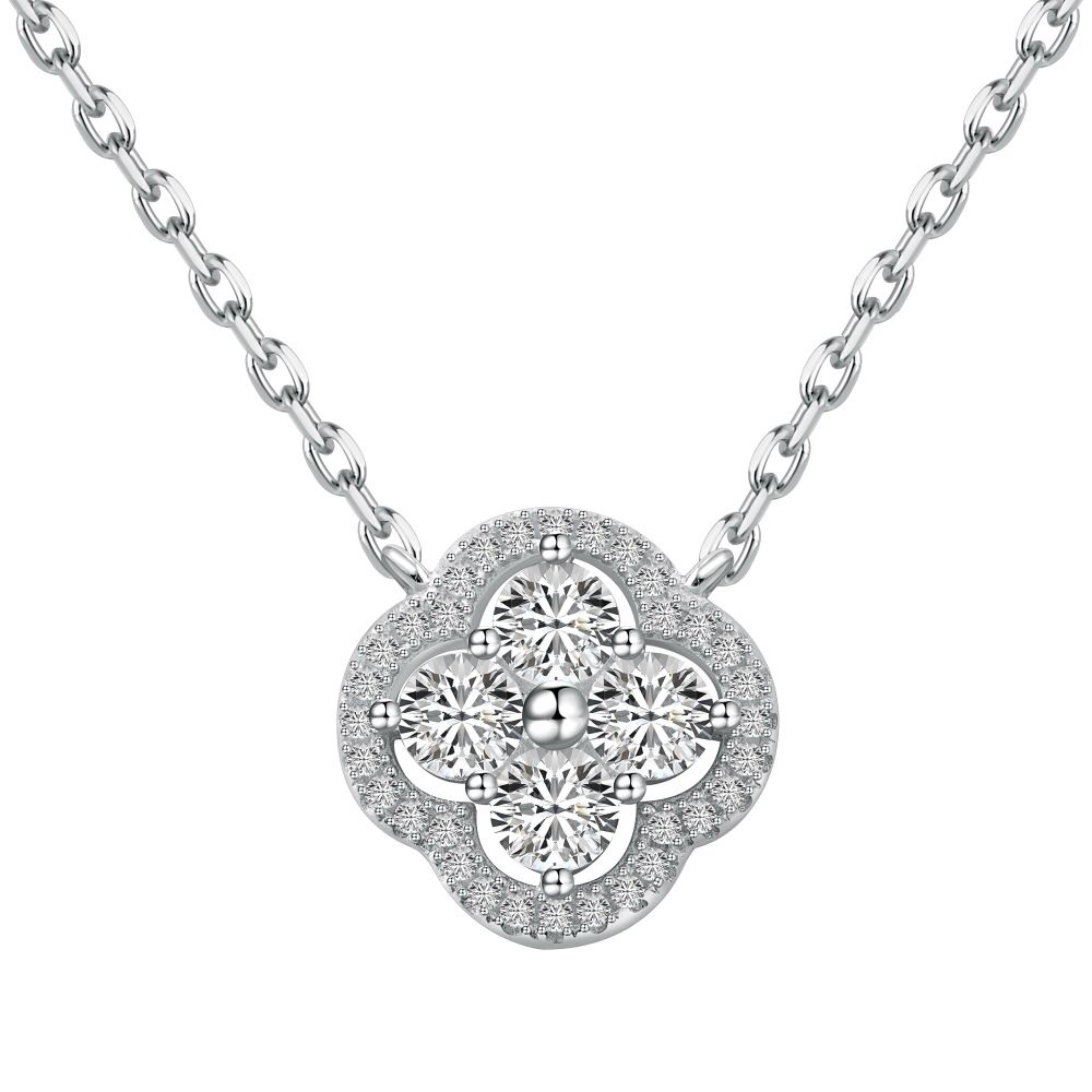A gold-plated clover necklace with 5A-grade zircon stones on a silver chain.