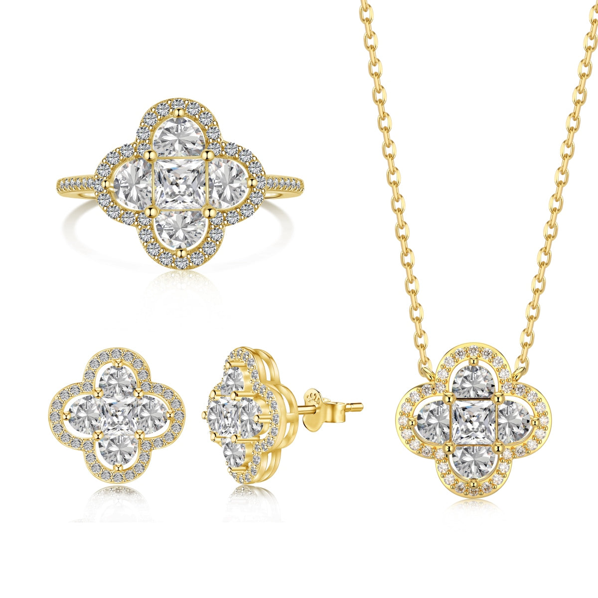 Gold jewelry set with diamond earrings and ring on a white background