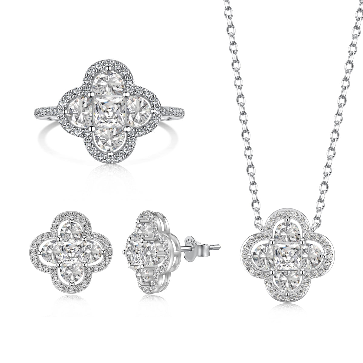 Diamond jewelry set with ring, earrings, and necklace on a white background