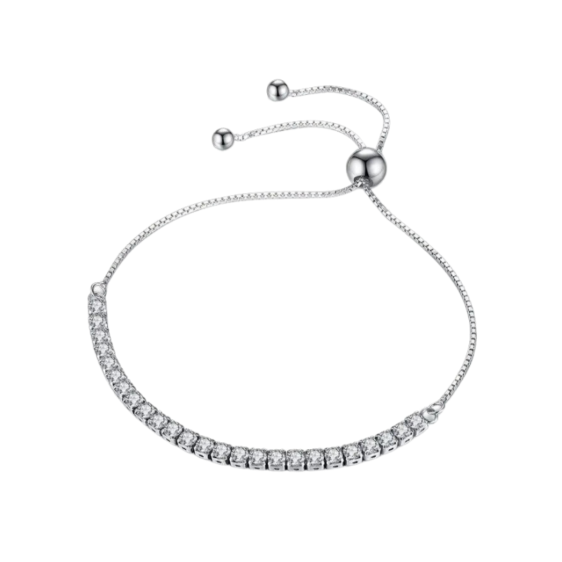 An adjustable silver bracelet with a row of sparkling stones, presented against a white background.