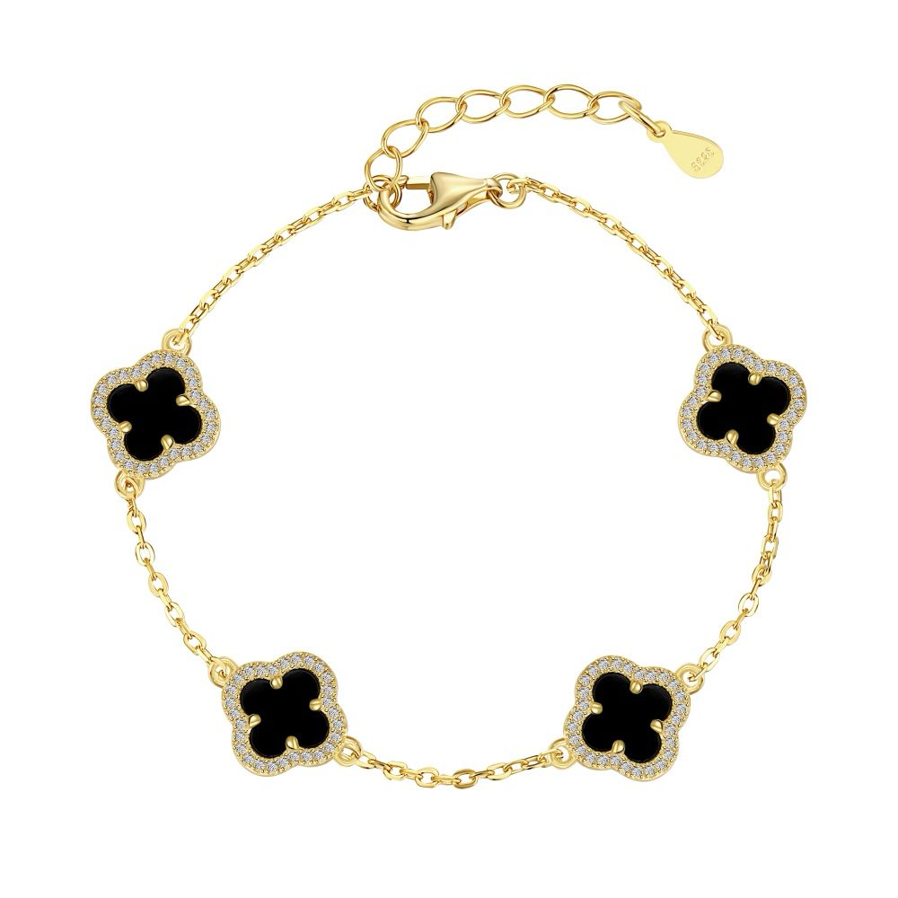 A gold-plated bracelet featuring a clover design with black shell accents on a sterling silver gold chain.