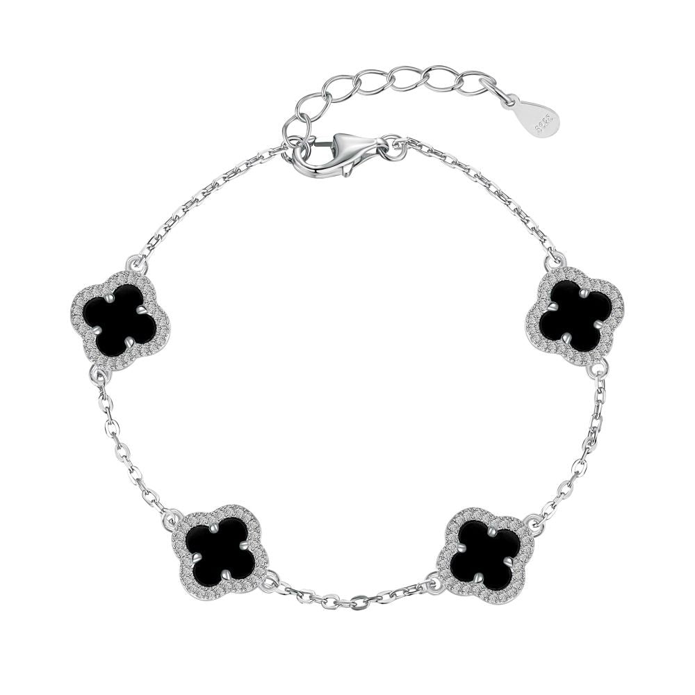 A silver-plated bracelet featuring a clover design with black shell accents on a sterling silver chain.
