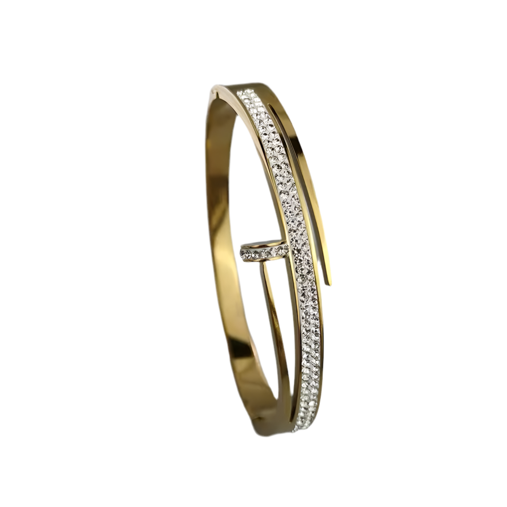 Gold bracelet with clear stones on a white background