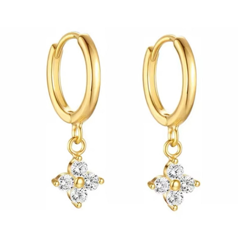 A pair of gold-colored hoop earrings with a floral petal drop design, crafted from stainless steel.