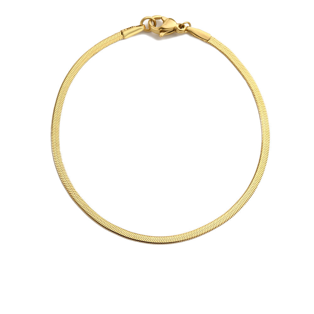 A gold-colored snake chain bracelet with a lobster clasp.