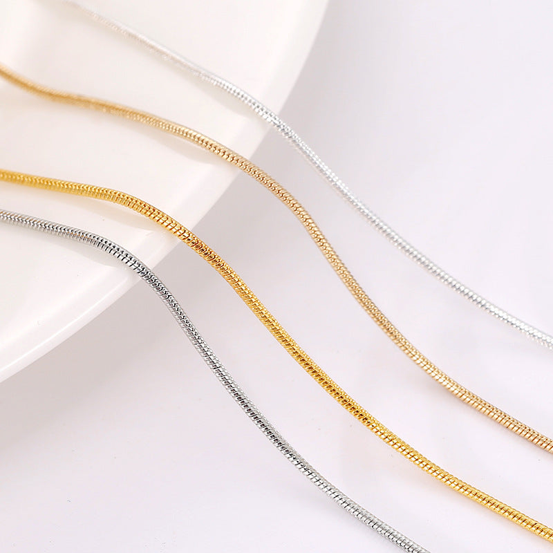 Gold & silver-colored snake chain bracelets.