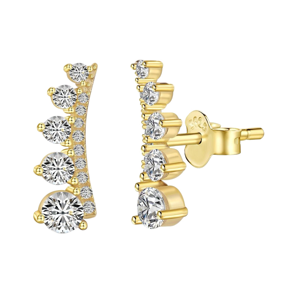 A pair of gold-colored Stone Row earrings featuring multiple round cut clear stones set in a row on a white background.