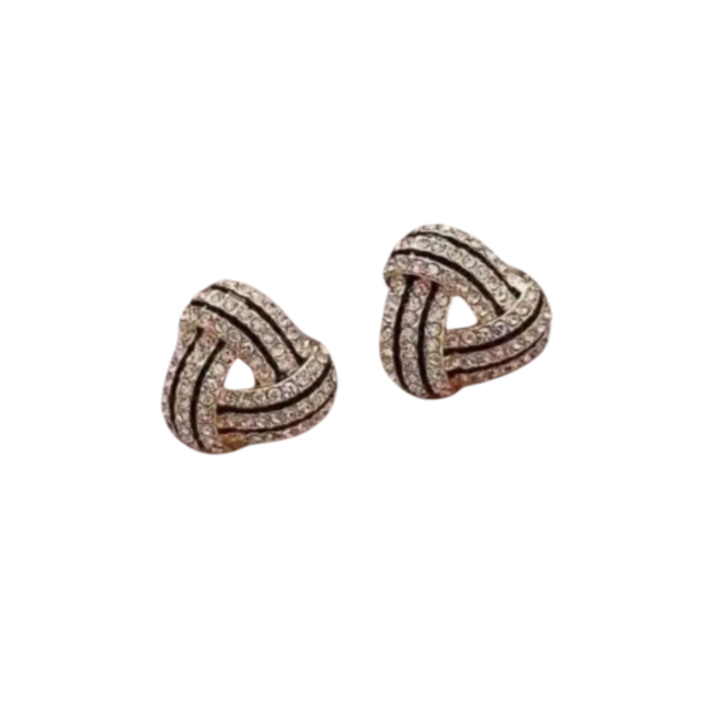 A pair of gold-colored Zara stud earrings with a geometric raised texture design.